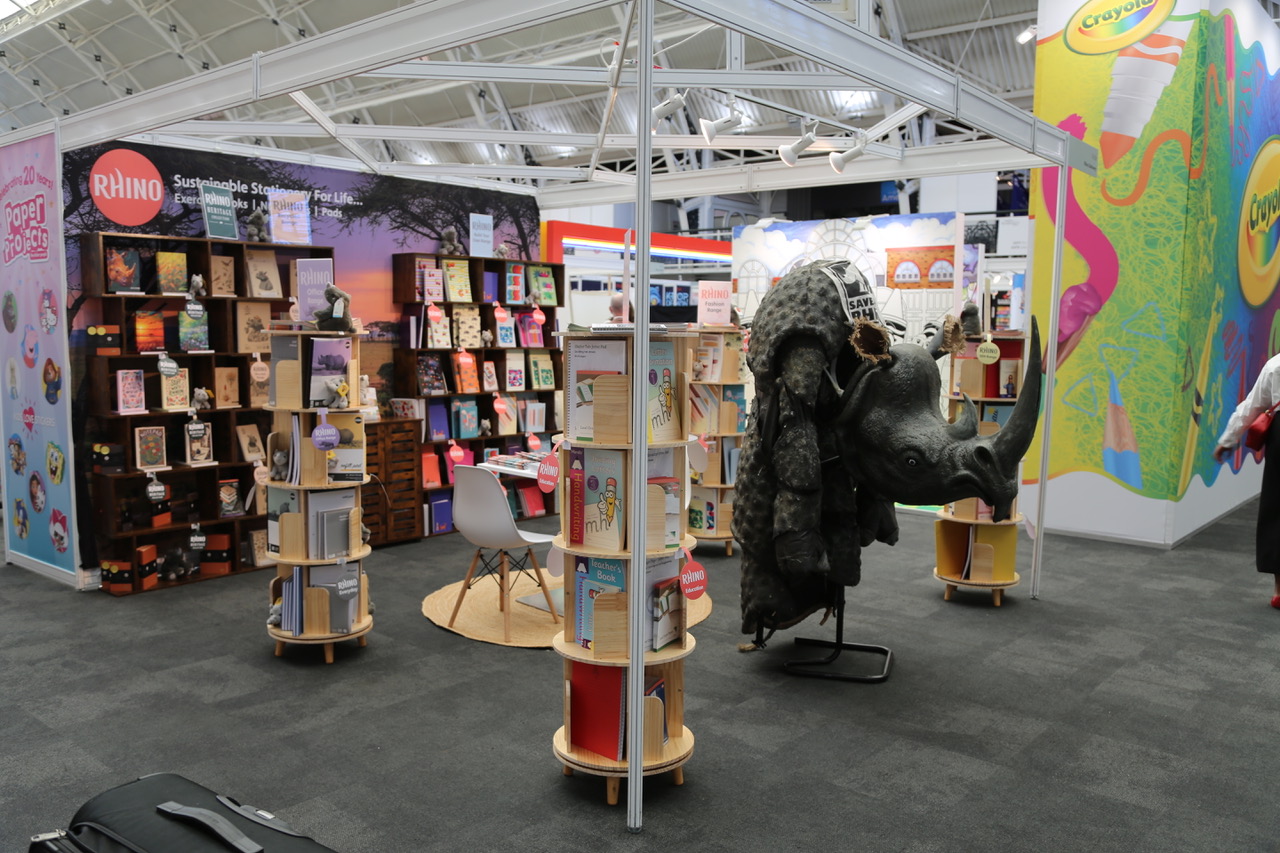 Wide view of the RHINO Stationery stand and rhinoceros mascot at the London Stationery Show